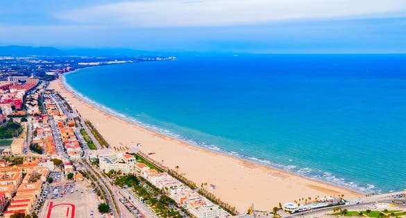 Photo of Valencia city beach aerial panoramic view.