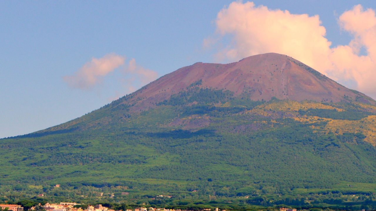 Majestic Mount Vesuvius under a clear blue sky, a striking natural landmark near Naples.jpg