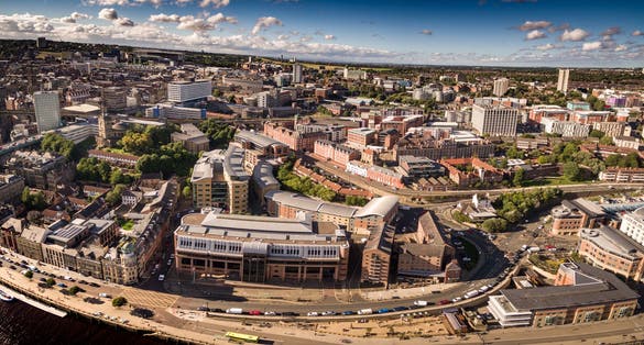 photo of view of Aerial view of Newcastle quayside and NE1 post code taken over the River Tyne in early evening.