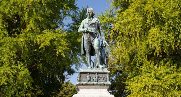 Annecy, France -Claude Louis Berthollet - a monument erected on the shores of Lake Annecy. Summer day