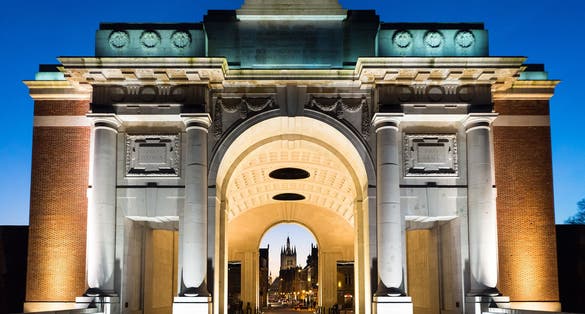 Photo of the Menin Gate Memorial to the Missing war memorial at night in Ypres, Belgium.