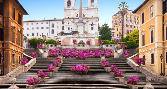 photo of Piazza di Spagna in Rome, italy. Spanish steps in Rome, Italy in the morning. One of the most famous squares in Rome, Italy. Rome architecture and landmark.
