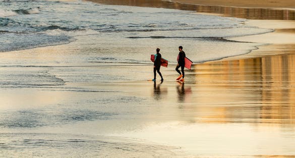 photo of surfing in Playa de Las Canteras (Las Palmas de Gran Canaria) in Spain.