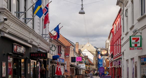 Outdoor exterior street view of the old town and shopping district in Aalborg, Denmark.