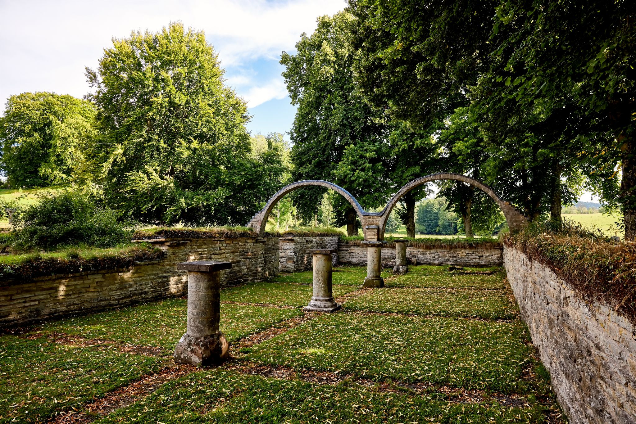 photo of old archway in the abbey ruins at at Varnhems monastery church in Sweden.