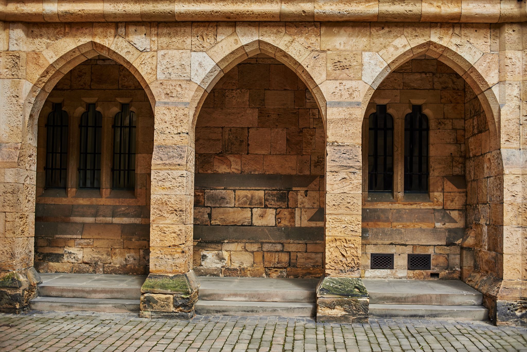 Photo of the courtyard of Alnwick Castle arches, England.
