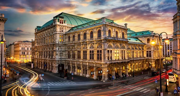 Photo of Vienna State Opera. Veinna, Austria. Evening view. The historic opera house is a symbol and landmark of the city of Vienna. 