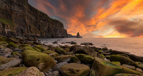 Photo of the Cliffs of Moher and castle Ireland.