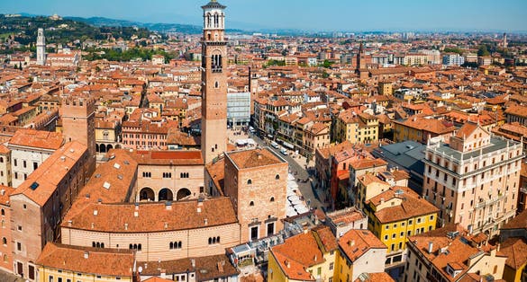 photo of Torre dei Lamberti aerial panoramic view. Torre Lamberti is tower in Piazza delle Erbe square in Verona, Veneto region in Italy.