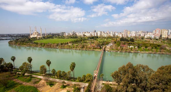 Photo of Adana central Sabanci Mosque with Seyhan river, Turkey.