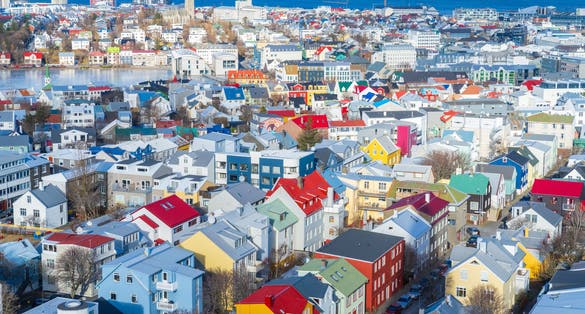 photo of view of Ariel views over the colourfull houses of Reykjavík in Iceland.
