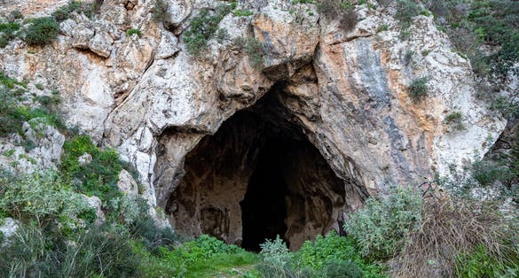 Photo of Entrance to Nestor's cave near Voidokilia Beach and Gialova Lagoon. Pylos-Nestor, Messenia, Peloponnese, Greece.