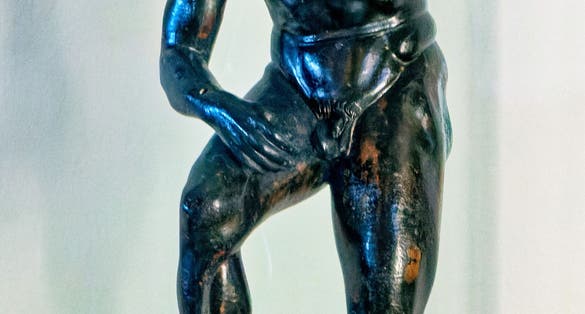 photo of Poseidon bronze statuette, Pella, Greece.