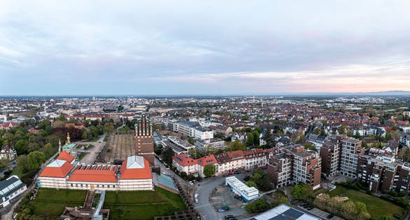 Photo of Drone panorama of the Hessian university city Darmstadt in Germany in the morning light .
