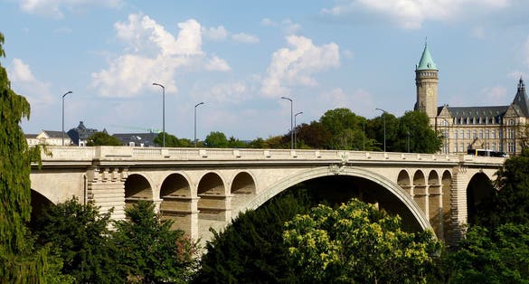 photo of the bridge of adolf (New bridge) - a bridge in the city of luxembourg, (built 1900-1903). The bridge connects upper and lower town: two parts of luxembourg. 