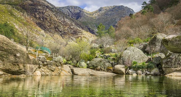 Natural swimming pools with rocks in the touristic place of Loriga, Serra da Estrela - Portugal. River pools at Loriga, Serra da Estrela - Portugal	