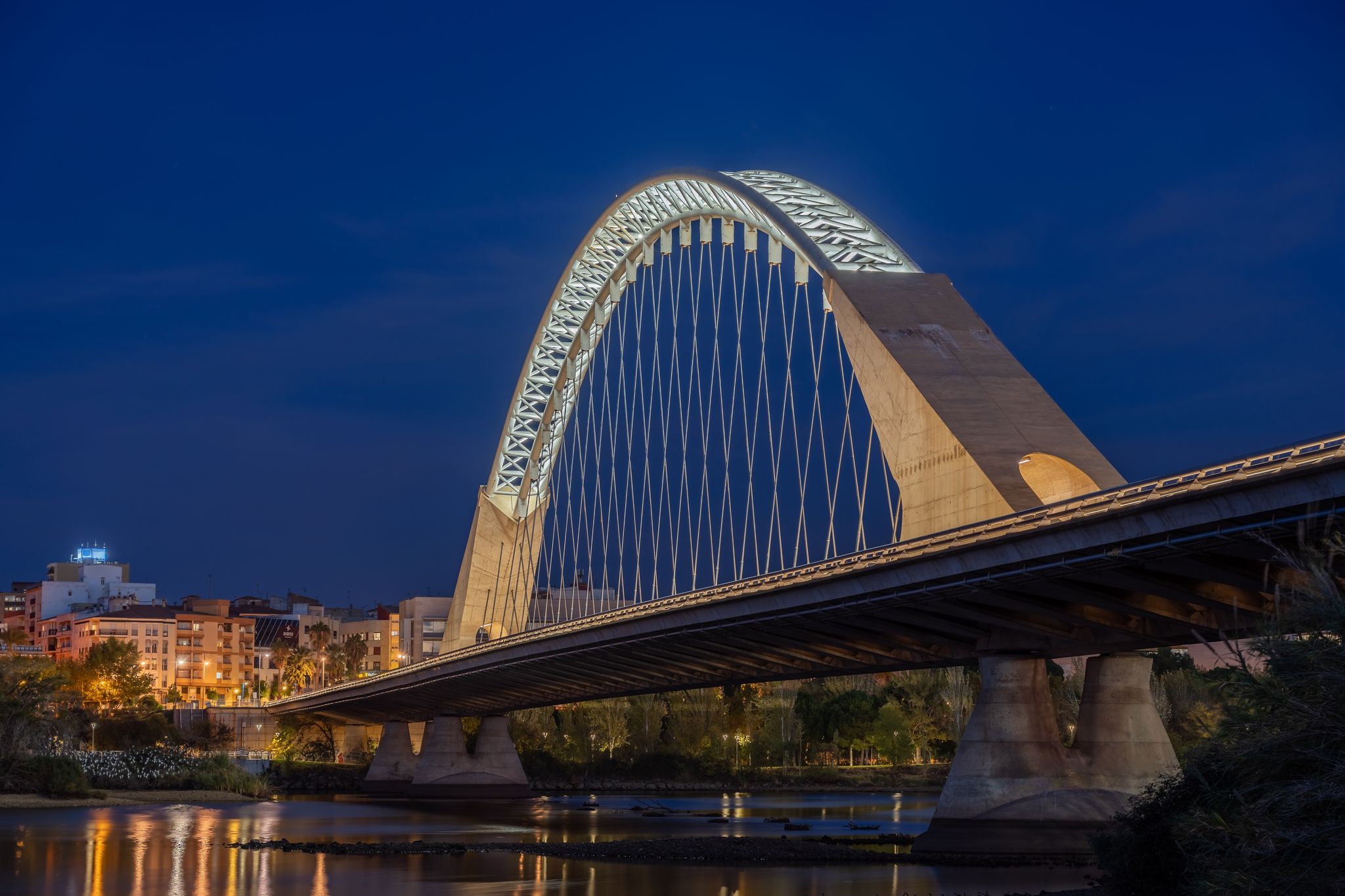 Photo of Lusitania Bridge of Merida on the blue hour at night , Spain .