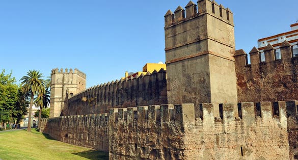 Photo of Ancient medieval walls in the district of Macarena, Seville, Spain .