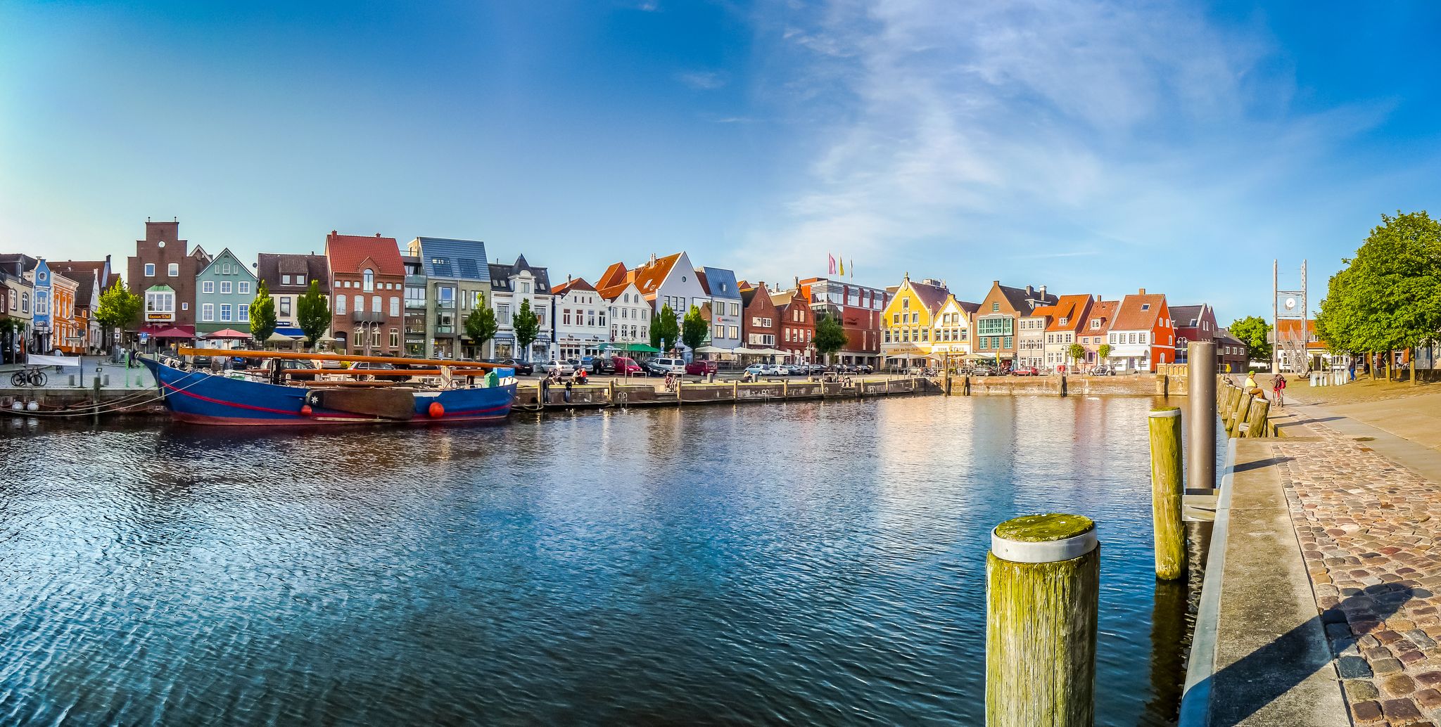 Photo of beautiful view of the old town of Husum, the capital of Nordfriesland and birthplace of German writer Theodor Storm, in Schleswig-Holstein, Germany.