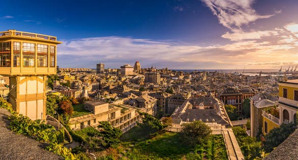 Photo of View of Genoa at sunset from "Spianata Castelletto", Italy.