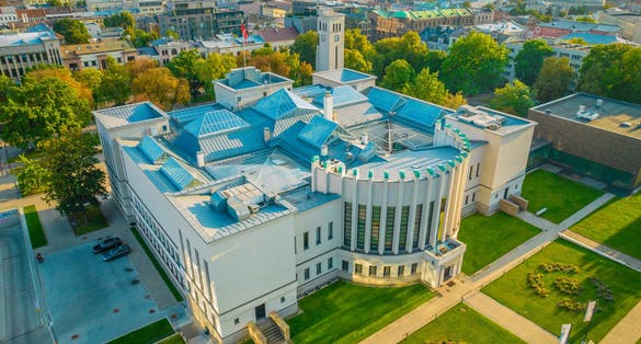 Aerial drone view of National M. K. Ciurlionis Art and Vytautas Magnus War museums building in Kaunas city center