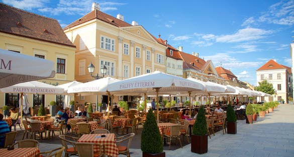 Gyor showing café lifestyle, outdoor eating and signage