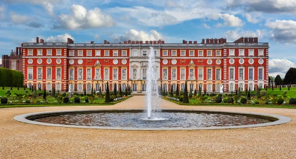 Photo of Hampton Court palace and gardens, London, UK.