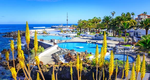 photo of beautifully saltwater pools Lago Martianez into a beautiful day in Puerto de la Cruz, Tenerife, Canary Islands, Spain.