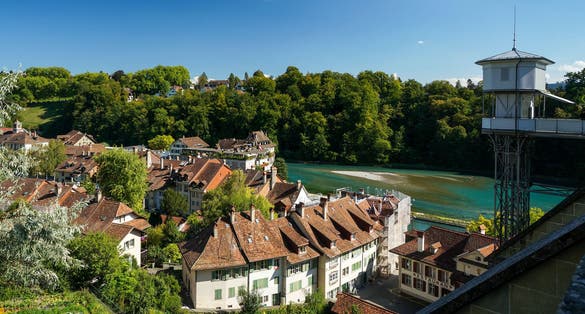 photo of city and Aare River seen from Münster platform Park in Bern, Switzerland.