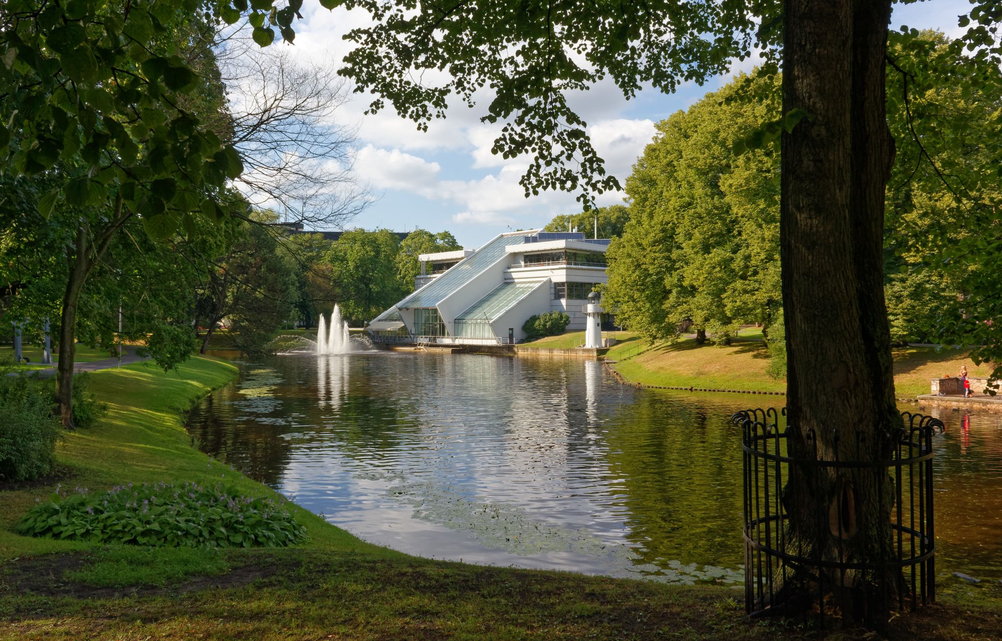 photo of kronvalda park in Riga, Latvia, with the port authority building in the background.