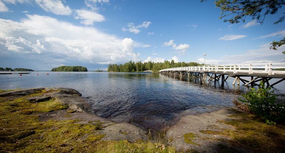 Photo of Long wooden bridge to Sulosaari in Savonlinna Finland .