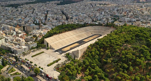 Photo of aerial drone photo of iconic ancient Panathenaic stadium or Kalimarmaro birthplace of the original Olympic games, Athens historic centre, Attica, Greece.