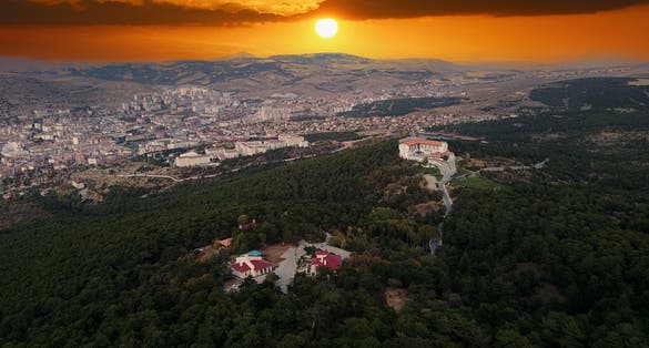 photo of yozgat city located in the middle of Turkey. A beautiful sunset at Yozgat pine grove national park. aerial shot with drone in forest with endemic pine trees.