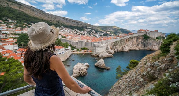 Photo of woman traveller at Dubrovnik Old Town.