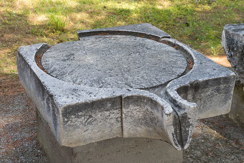 photo of view Ancient Greek or Roman piece of a wine- or olive-press, Lefkada, Greece.