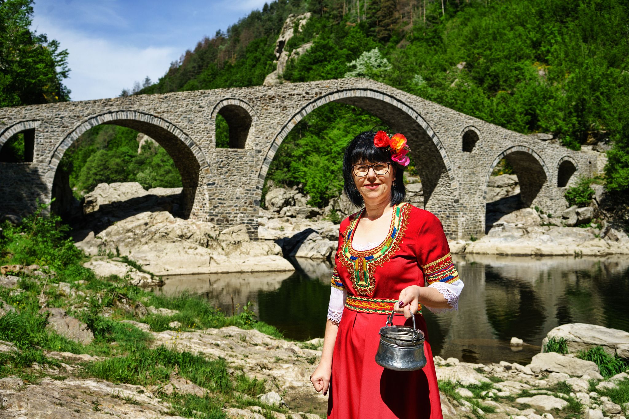 photo of  view of Traditional Dressed woman in Devils Bridge at Bulgaria,Diadovtsi bulgaria.