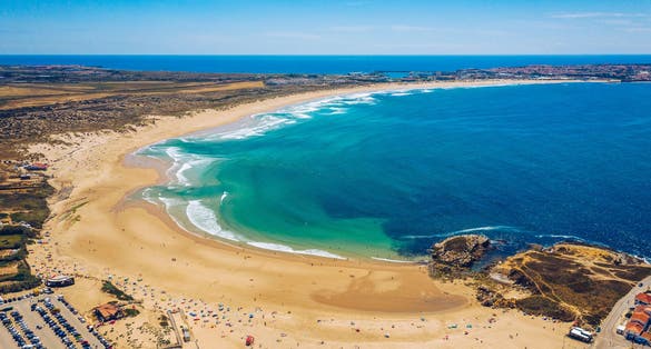 Photo of Campismo beach and Dunas beach and Island Baleal near Peniche on the shore of the Atlantic ocean.
