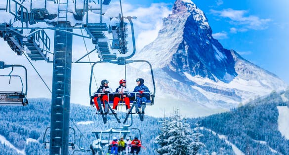 photo of amazing beautiful view of Gornergrat, Zermatt, Matterhorn ski resort in Switzerland with cable chairlift transport.