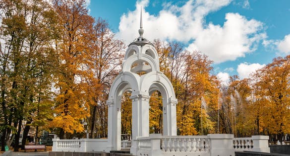 Photo of mirror Stream fountain architecture sight in colorful autumn Kharkiv city center, Ukraine.
