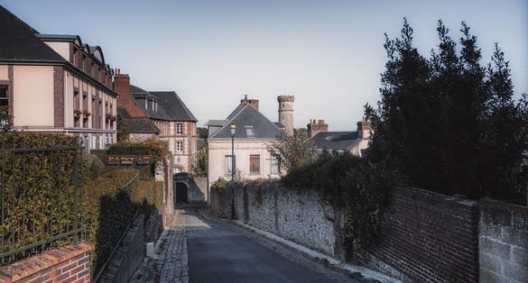 photo of view of Picturesque street view in Honfleur. Honfleur, a charming French town, sits where the Seine River flows into the English Channel, in the northern part of Normandy