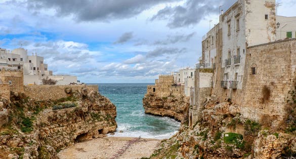 Overview on a March day of the famous Lama Monachile beach in Polignano a Mare, Puglia, Italy