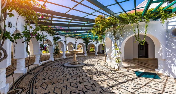 Photo of beautiful buildings at Kalithea Springs constructed in the 1930s, Rhodes Island, Greece.