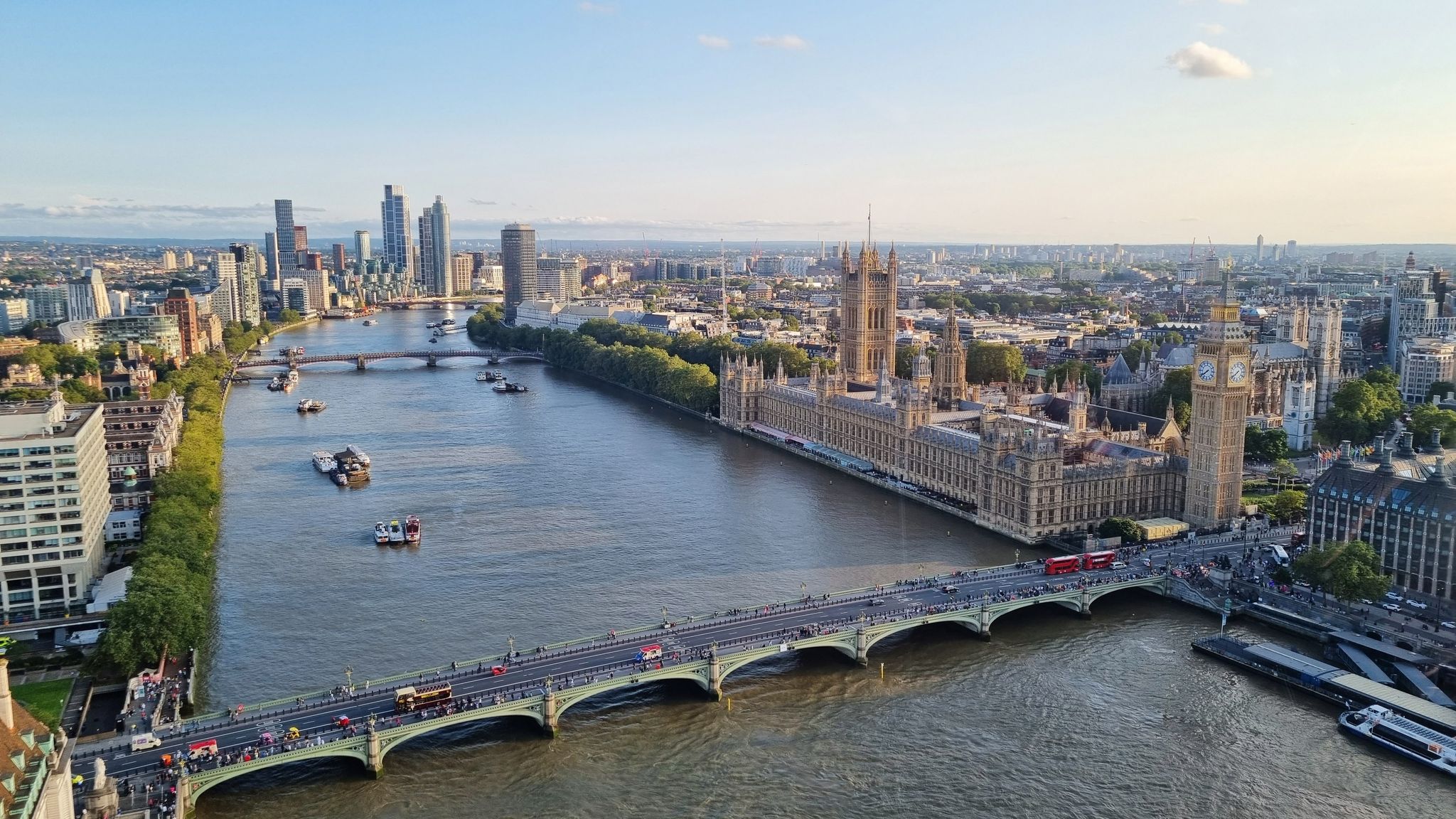 Aerial view of the River Thames, Westminster Bridge, and the Palace of Westminster at sunset..jpg