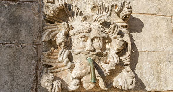 Photo of fragment of Big Onofrio fountain in the Old city of Dubrovnik, Croatia.