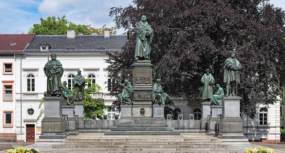 Martin Luther Monument in Worms, Germany. The monument was unveiled in 1868. The german text on the pedestal reads: "Here I stand, I cannot do otherwise. God help me! Amen!"