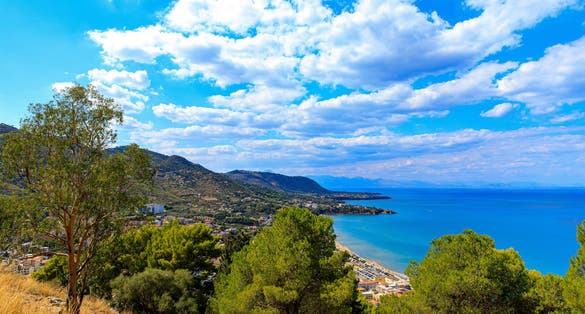 photo of View over the historical city center of Cefalù, the beach and the ocean, seen from Castello di Cefalù, a castle on a high rock, Rocca di Cefalù