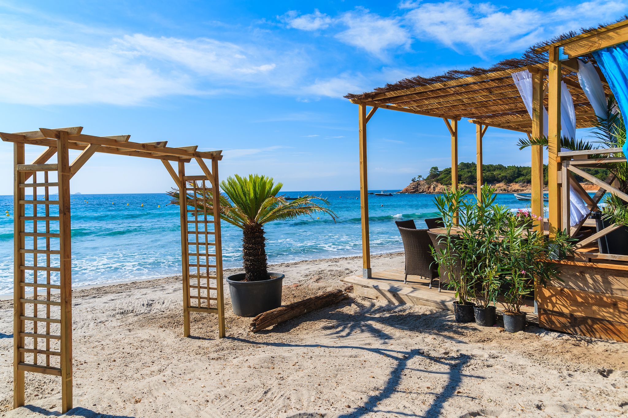 Photo of amazing landscape with wooden pier on Santa Giulia beach, Porto-Vecchio ,France.
