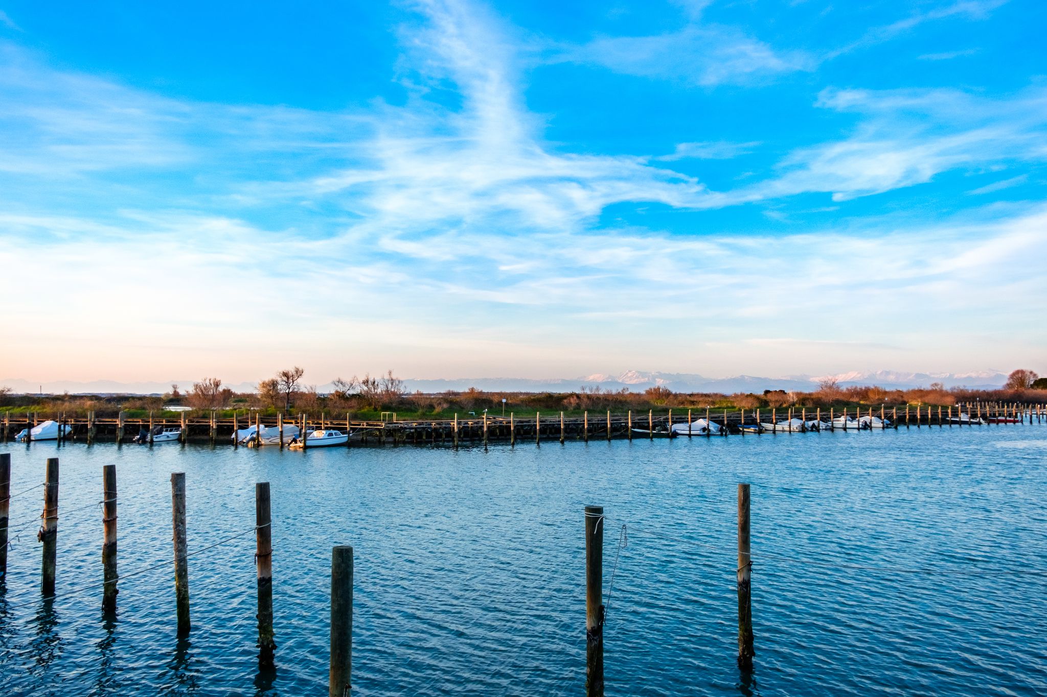 Photo of Pier and sea in town of Grado sunrise view, Italy.