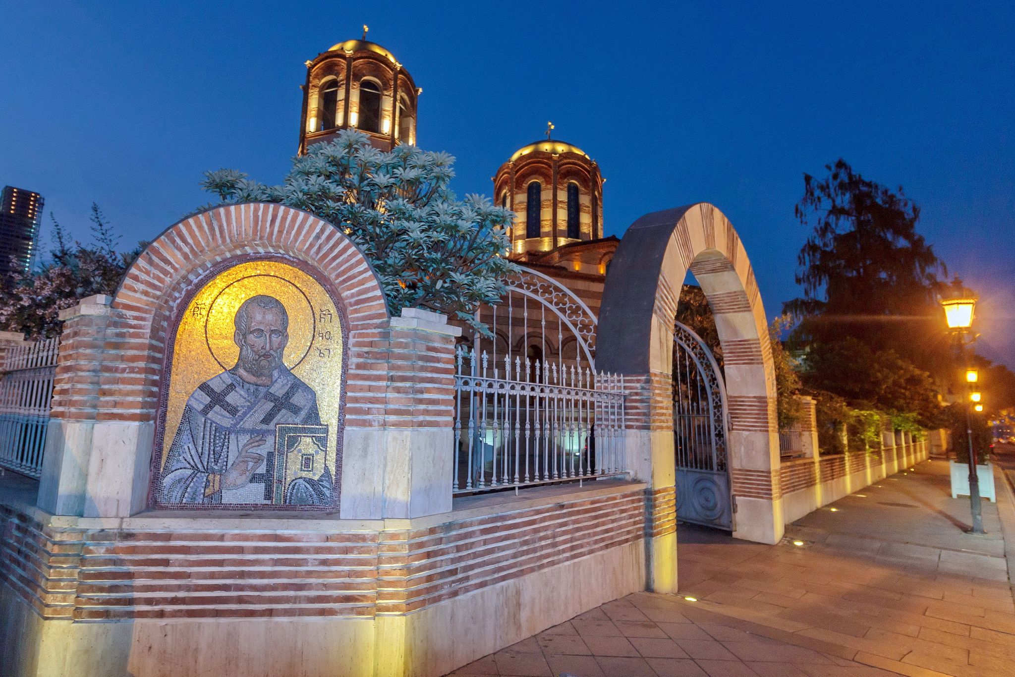 Photo of The Church of St. Nicholas the Wonderworker is located in the very center of Batumi. This church is more than 150 years old, and it is one of the oldest churches in the city. Night photography.