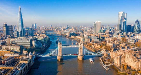 Photo of aerial view of iconic Tower Bridge in London. One of London's most famous bridges and must-see landmarks on the Thames River.